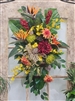Large tropical artificial door swag with birds of paradise, ginger flowers, orchids, and lush silk greenery.