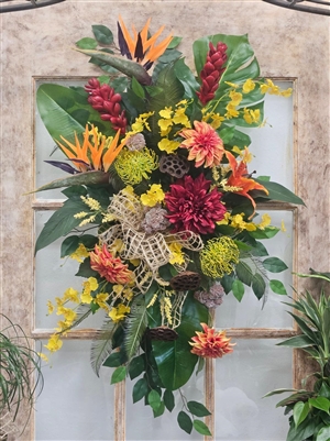 Large tropical artificial door swag with birds of paradise, ginger flowers, orchids, and lush silk greenery.