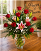 Red rose and stargazer lily arrangement with baby's breath and eucalyptus in a glass vase