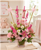 Pink new baby girl flower arrangement with roses, stargazer lilies, carnations, daisies and keepsake baby booties