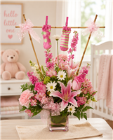 Pink new baby girl flower arrangement with roses, stargazer lilies, carnations, daisies and keepsake baby booties