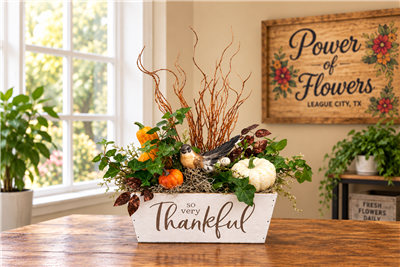So Very Thankful fall Thanksgiving centerpiece with seasonal greenery and autumn accents in a keepsake container