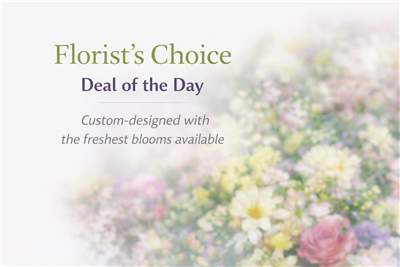 Custom florist choice bouquet with seasonal flowers and greenery in a vase arrangement