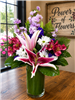 Stargazer lily and lavender stock flower arrangement with daisies and pink alstroemeria