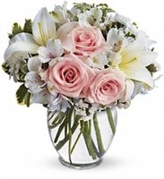 Delightful bouquet with light pink roses, white Asiatic lilies, alstroemeria, chrysanthemums, and statice arranged in a clear vase â€” approx. 10.5" x 11", all-around.