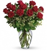 Always on My Mind bouquet with a dozen red roses and fresh greens in a spring garden glass vase