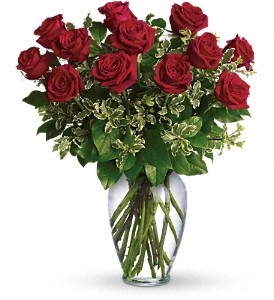 Always on My Mind bouquet with a dozen red roses and fresh greens in a spring garden glass vase